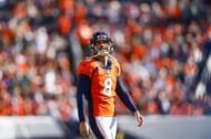 Brandon McManus of the Denver Broncos reacts after missing a 56-yard field goal attempt